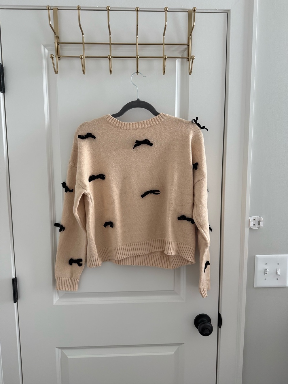 Dreamers Cream Sweater with Black Bow Accents